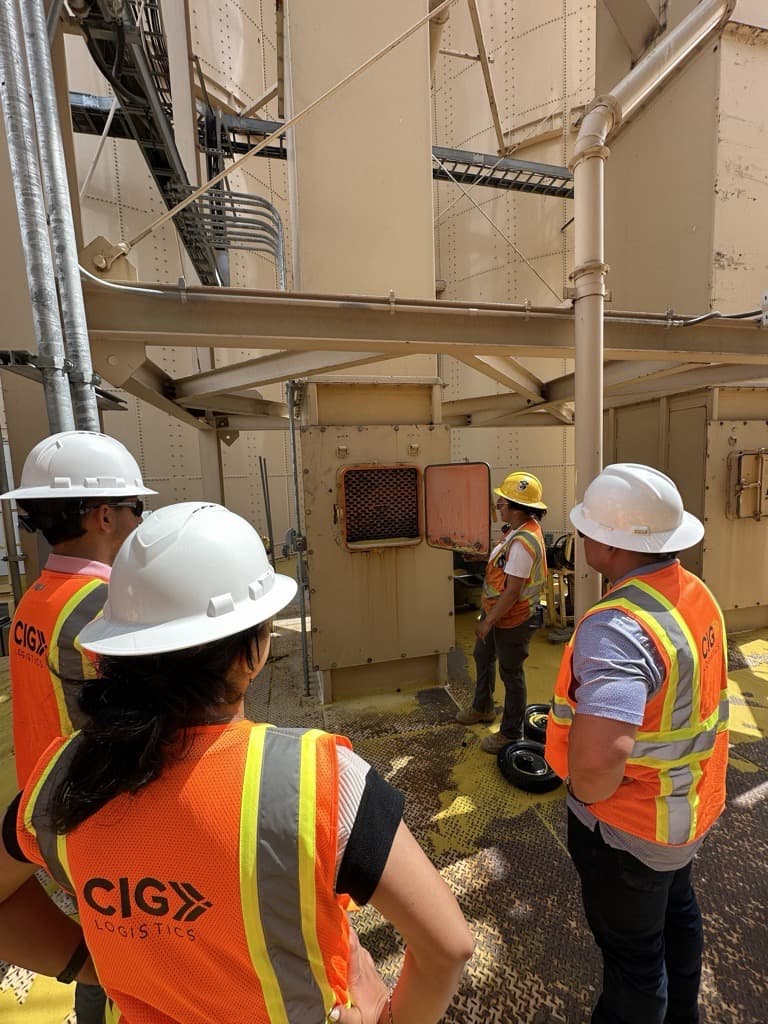 CIG team members reviewing terminal equipment together